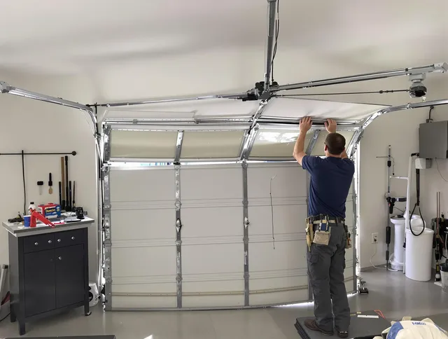 South Pasadena Garage Door Repair specialist performing precise section replacement on South Pasadena garage door